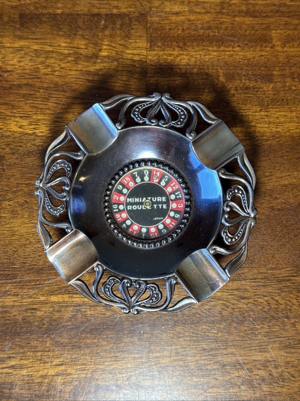 VINTAGE LAS VEGAS ROULETTE WHEEL COPPER TONED ASHTRAY, STILL WORKS